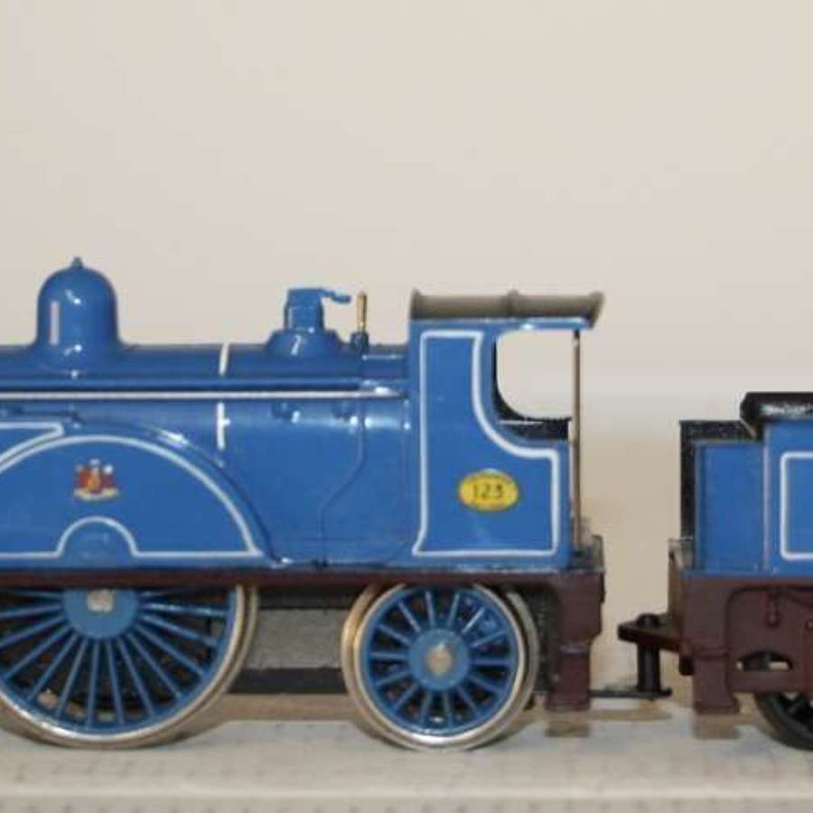 A boxed Hornby R553 Caledonian Railway 4-2-2 locomotive.Mild play worn