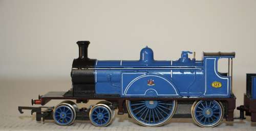 A boxed Hornby R553 Caledonian Railway 4-2-2 locomotive.Mild play worn