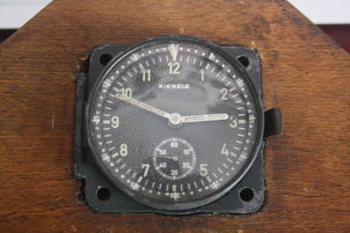 A WW2 GERMAN FIGHTER AIRCRAFT. 8 DAY COCKPIT CLOCK BY KINZLE.