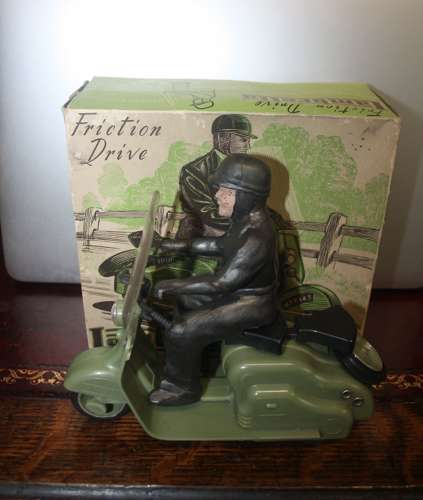 A vintage late 1950's/early 1960's Mettoy friction drive Lambretta sco