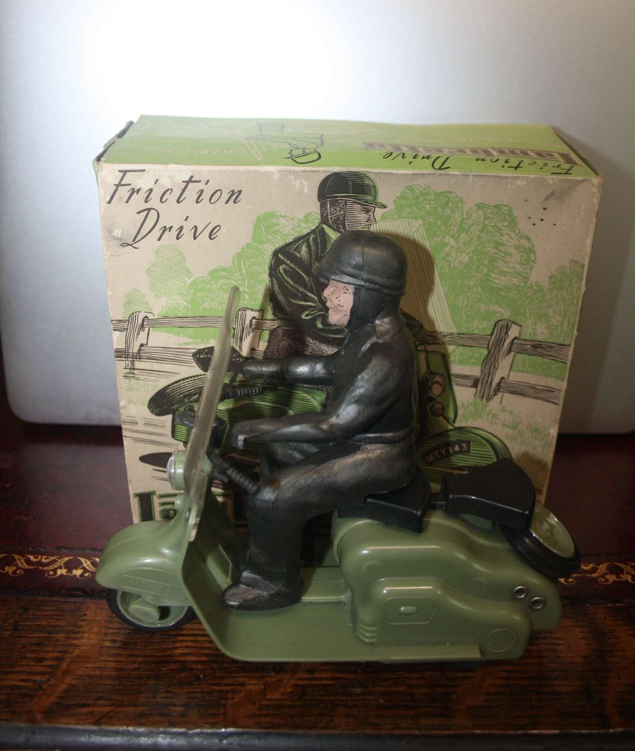 A vintage late 1950's/early 1960's Mettoy friction drive Lambretta sco