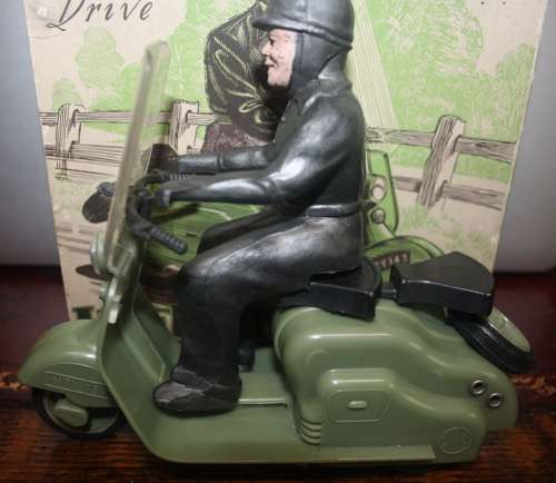 A vintage late 1950's/early 1960's Mettoy friction drive Lambretta sco