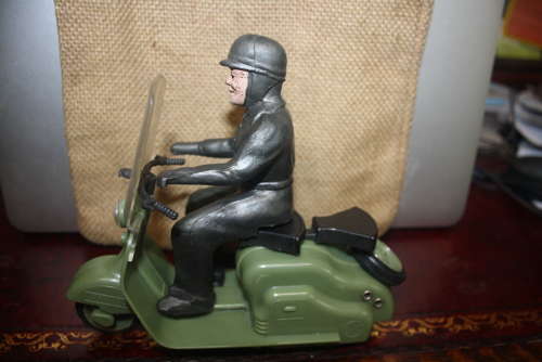 A vintage late 1950's/early 1960's Mettoy friction drive Lambretta sco