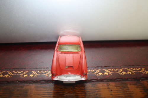 A boxed Corgi No.218 Aston Martin DB4 (mild playwear and box mild play