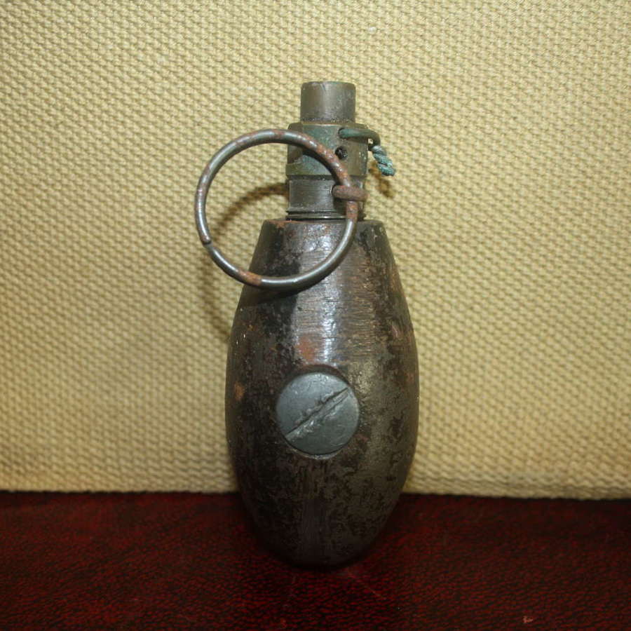 A WW1 BRITISH NO34 GRANADE DATED 1917.