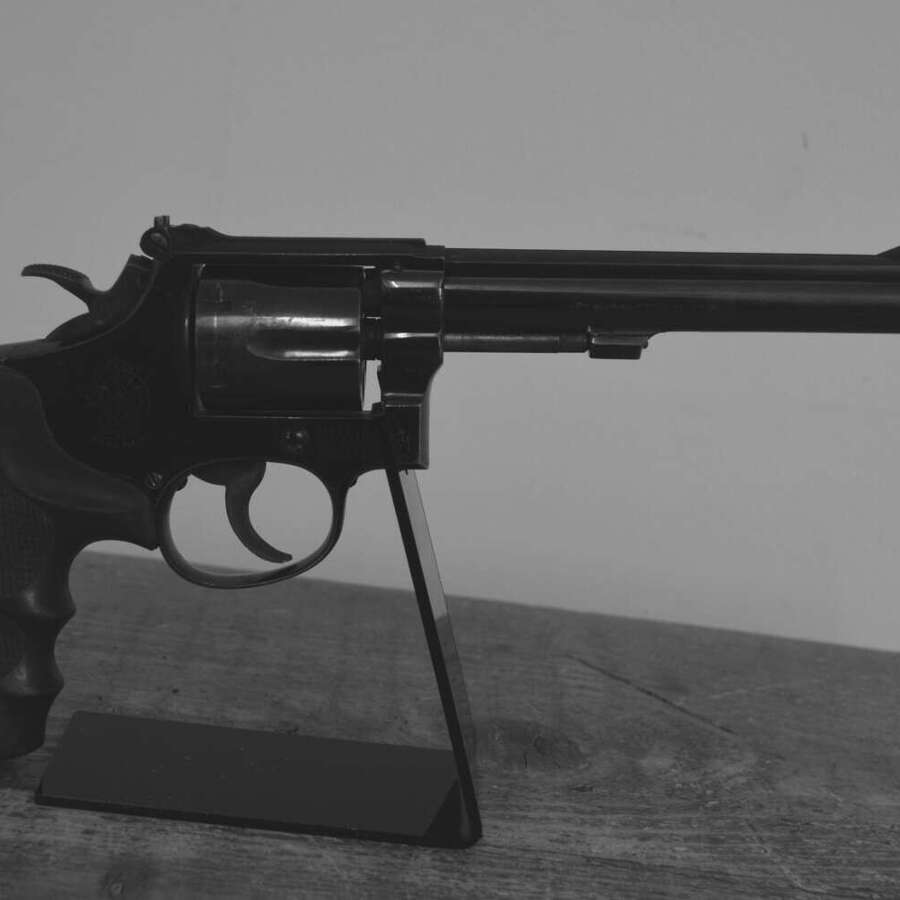 A EU DEACTIVATED SMITH & WESSON .38 K14 6" BARREL MOVING CYLINDER.