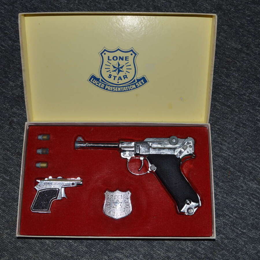 A LONE STAR BOXED LUGER WEAR WITH AGE COMPLETE.