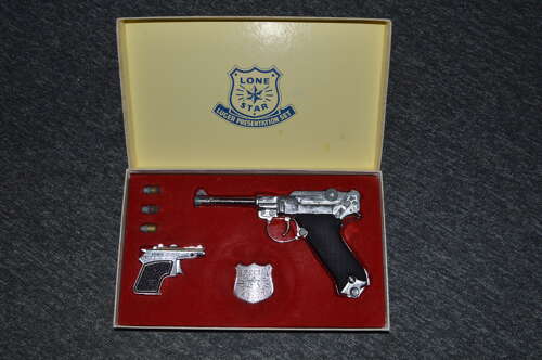 A LONE STAR BOXED LUGER WEAR WITH AGE COMPLETE.
