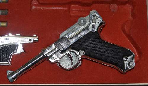 A LONE STAR BOXED LUGER WEAR WITH AGE COMPLETE.