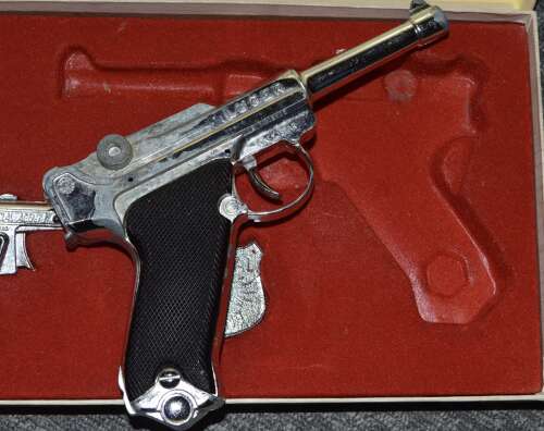 A LONE STAR BOXED LUGER WEAR WITH AGE COMPLETE.