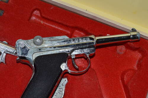 A LONE STAR BOXED LUGER WEAR WITH AGE COMPLETE.
