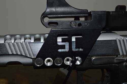 A CASED 9MM PARA BUL CUSTOM M5 RACE GUN. WITH 3 SPARE MAGS.
