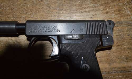 A .32 WEBLEY AUTO PISTOL. FITTED WITH A DUMMY SILENCER. EU DEACT.