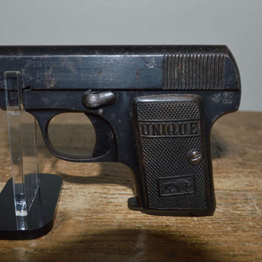 A EU DEACTIVATED 6.35 UNIQUE SEMI AUTO PISTOL.