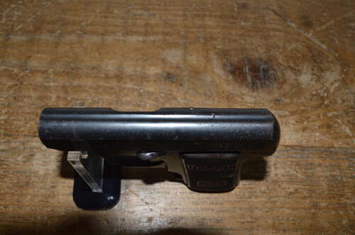 A EU DEACTIVATED 6.35 UNIQUE SEMI AUTO PISTOL.