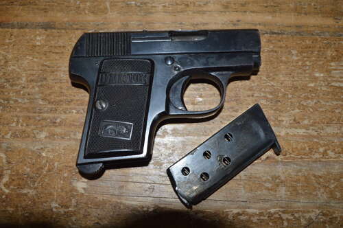A EU DEACTIVATED 6.35 UNIQUE SEMI AUTO PISTOL.