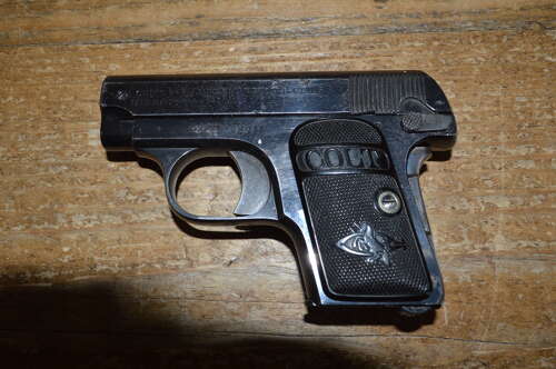 A EU DEACTIVATED COLT 1908 .25CAL SEMI AUTO PISTOL.MOVING PARTS NO DRY FIRER.