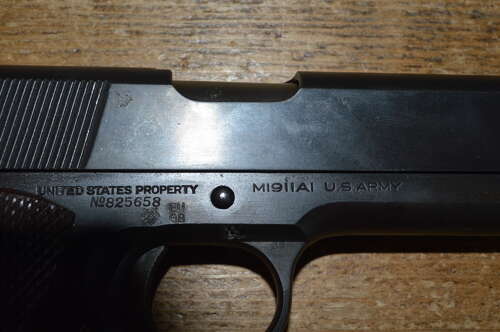 A EU DEACTIVATED WW2 COLT 1911. ORIGINAL FRAME HAS HAD NEW SLIDE.