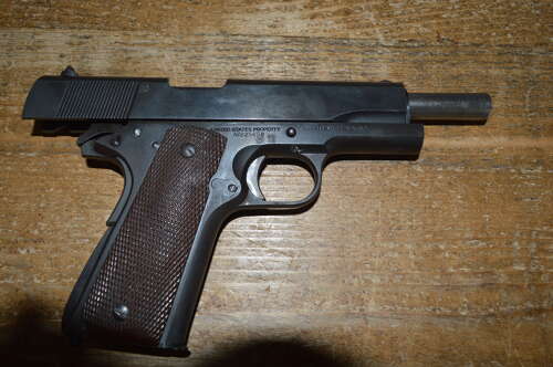 A EU DEACTIVATED WW2 COLT 1911. ORIGINAL FRAME HAS HAD NEW SLIDE.