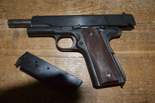 A EU DEACTIVATED WW2 COLT 1911. ORIGINAL FRAME HAS HAD NEW SLIDE.