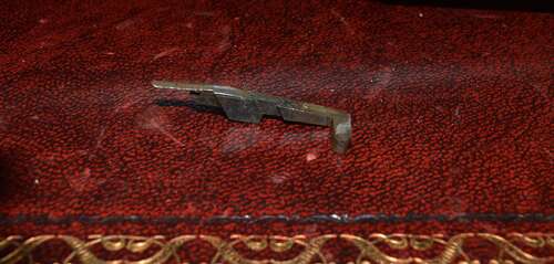 A ORIGINAL WW1 LUGER HOLD OPEN DEVICE WITH ITS SPRING.
