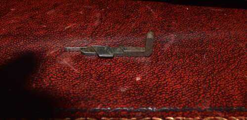 A ORIGINAL WW1 LUGER HOLD OPEN DEVICE WITH ITS SPRING.
