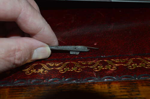 A ORIGINAL WW1 LUGER HOLD OPEN DEVICE WITH ITS SPRING.