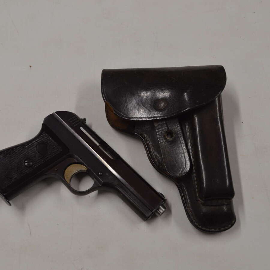 A WW2 7.65 MOD 27 SEMI AUTO PISTOL.WAFFENAMPT MARKED.NEW SPEC.COMES WITH ORIGINAL HOLSTER.