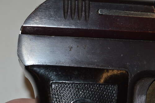 A WW2 7.65 MOD 27 SEMI AUTO PISTOL.WAFFENAMPT MARKED.NEW SPEC.COMES WITH ORIGINAL HOLSTER.