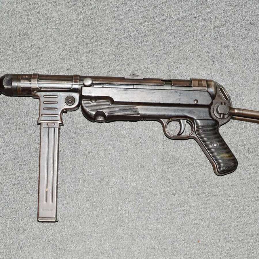 A 1942 DATED MP40 NEW SPEC DEACT . ALL MOVING PARTS NO DRY FIRE.