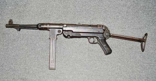 A 1942 DATED MP40 NEW SPEC DEACT . ALL MOVING PARTS NO DRY FIRE.