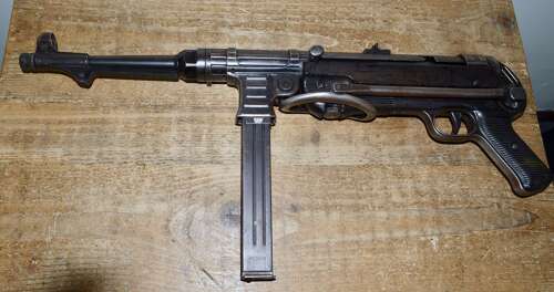 A 1942 DATED MP40 NEW SPEC DEACT . ALL MOVING PARTS NO DRY FIRE.