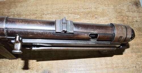 A 1942 DATED MP40 NEW SPEC DEACT . ALL MOVING PARTS NO DRY FIRE.