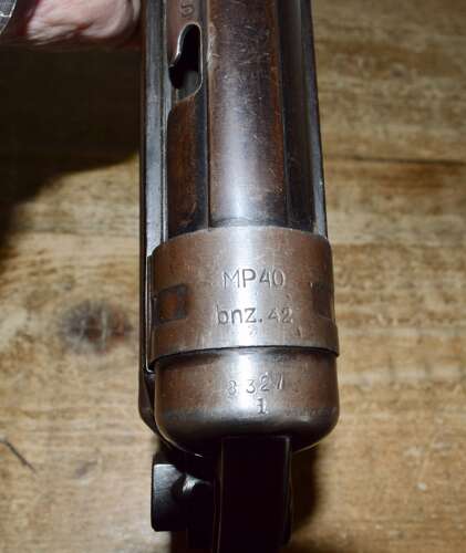 A 1942 DATED MP40 NEW SPEC DEACT . ALL MOVING PARTS NO DRY FIRE.