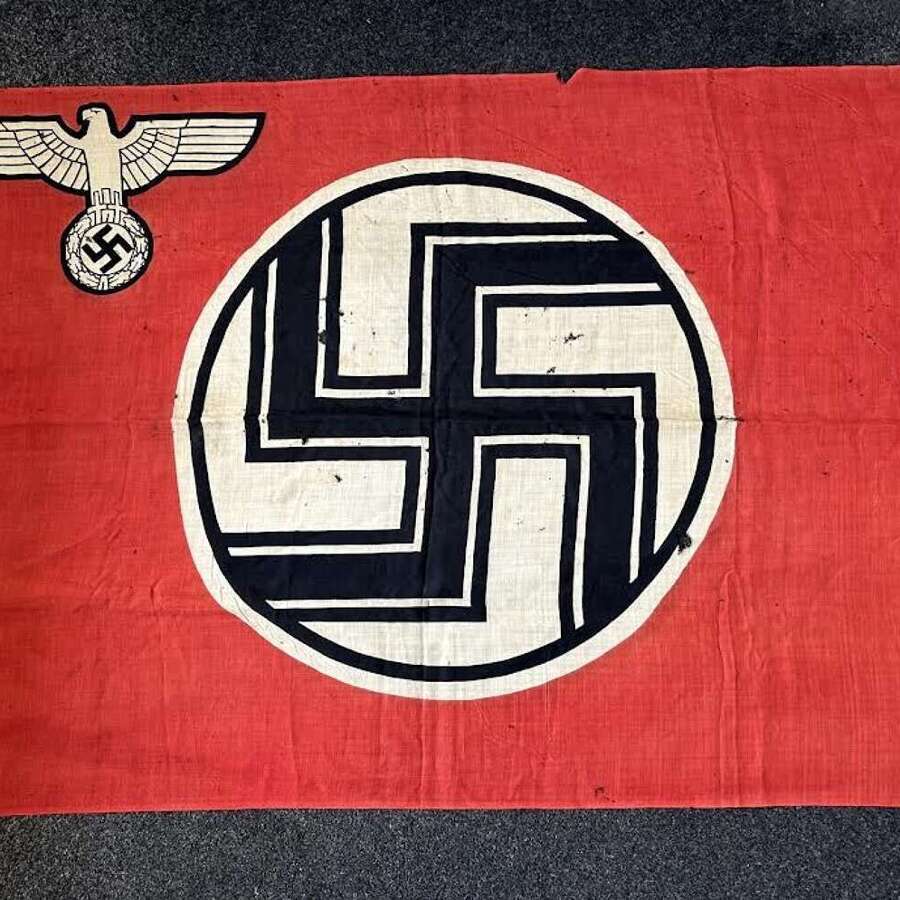 A WW2 German State Service flag (Reichsdienstflagge),  flag with sewn edge, attached lab