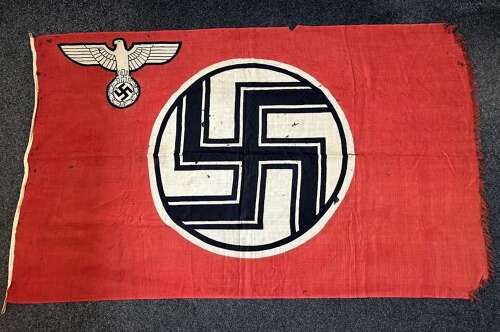 A WW2 German State Service flag (Reichsdienstflagge),  flag with sewn edge, attached lab