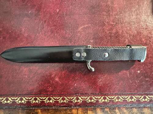 A reproduction Hitler Youth style Dagger . Over 18s only .