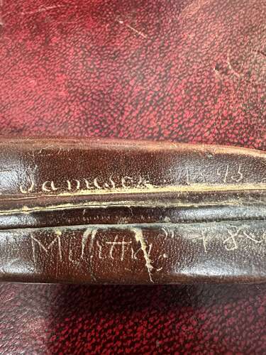 A 19th century green river hunting knife. In leather scabbard.