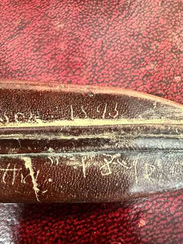 A 19th century green river hunting knife. In leather scabbard.